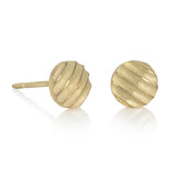 Lunar stud earrings formed of an undulating texture in 18ct gold.  Lunar stud earrings by Sarah Herriot.