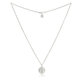 This striking silver lunar necklace features a hollow sphere inspired by planetary forms, meticulously crafted to catch the  light beautifully. Expertly crafted with attention to form and proportion and suspended on a refined spiga chain, it will add dimension to any ensemble.  Lunar necklace by Sarah Herriot.