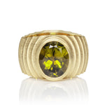 Lunar ring in 18ct gold with oval olive green tourmaline by Sarah Herriot.