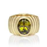 Lunar ring in 18ct gold with oval olive green tourmaline by Sarah Herriot.