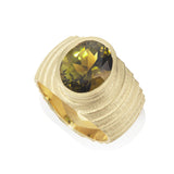 Lunar ring in 18ct gold with oval olive green tourmaline by Sarah Herriot.