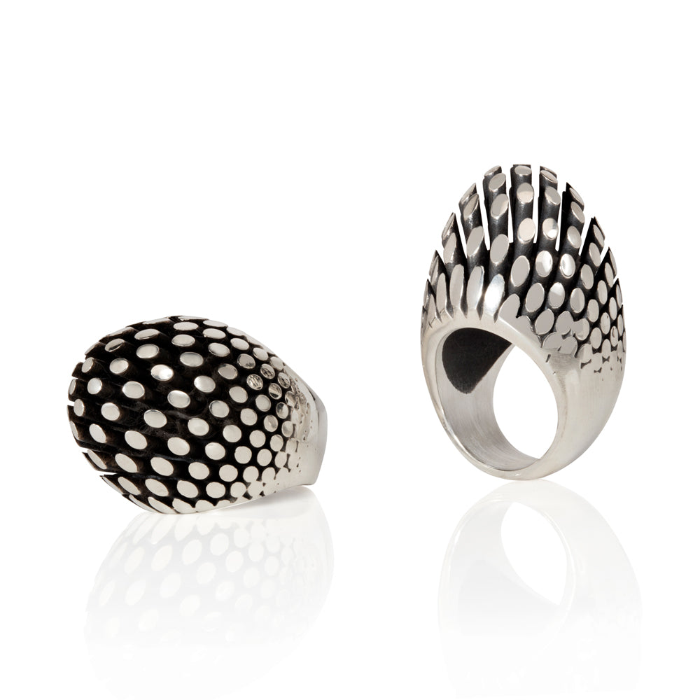 Manhattan ring is a wonderfully architecturally formed ring in silver, the form created from rods of silver with oxidised recesses to accentuate the sculptural nature of the piece. Manhattan ring by Sarah Herriot.