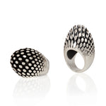 Manhattan ring is a wonderfully architecturally formed ring in silver, the form created from rods of silver with oxidised recesses to accentuate the sculptural nature of the piece. Manhattan ring by Sarah Herriot.