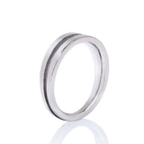 Wedding band in palladium with black rhodium recess by Sarah Herriot.