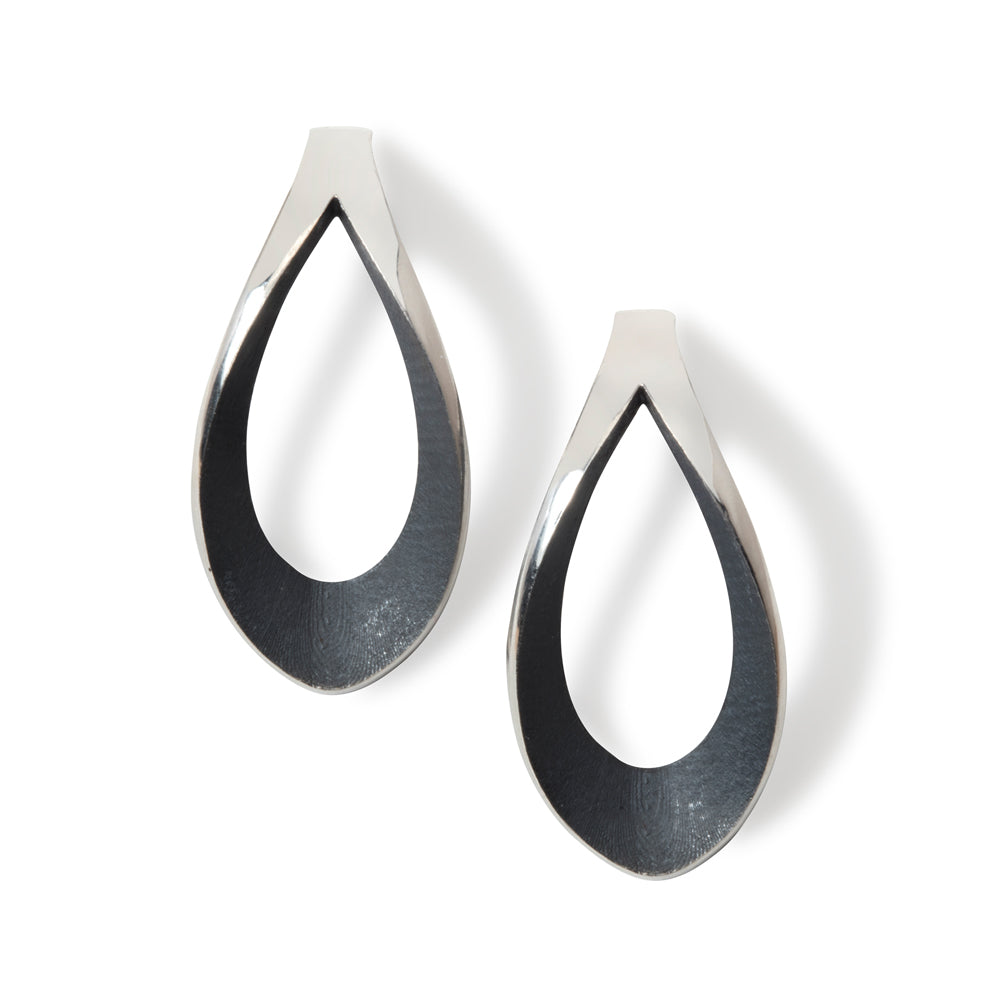 Mirror twist earrings in silver with oxidised sections by Sarah Herriot.