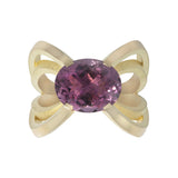 Papillion ring in 18ct gold using unusual bold and open yet strong setting which allows the stunning purple tourmaline to shine in all its glory. Papillion ring by Sarah Herriot.