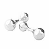 These understated plain bar cufflinks feature a smooth flowing dumbell design in solid silver, embodying refined minimalism. The geometric balance of the bar and ball design creates visual interest without ornamentation, making them a versatile choice for the discerning wearer who values timeless craftsmanship over trend.  Plain bar cufflinks by Sarah Herriot.