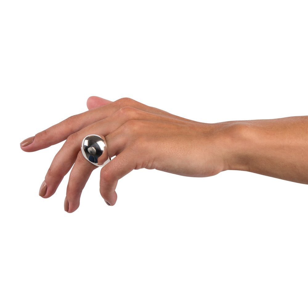 Plain egg ring is a beautifully ergonomic shaped hollow egg. This ring is part of the egg series of rings by Sarah. Plain egg ring by Sarah Herriot.
