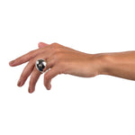 Plain egg ring is a beautifully ergonomic shaped hollow egg. This ring is part of the egg series of rings by Sarah. Plain egg ring by Sarah Herriot.