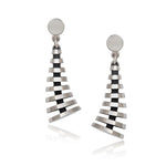 Pyramid drop earrings have a elegant modern structure with oxidised recesses to accentuate the design in silver. Pyramid drop earrings by Sarah Herriot.