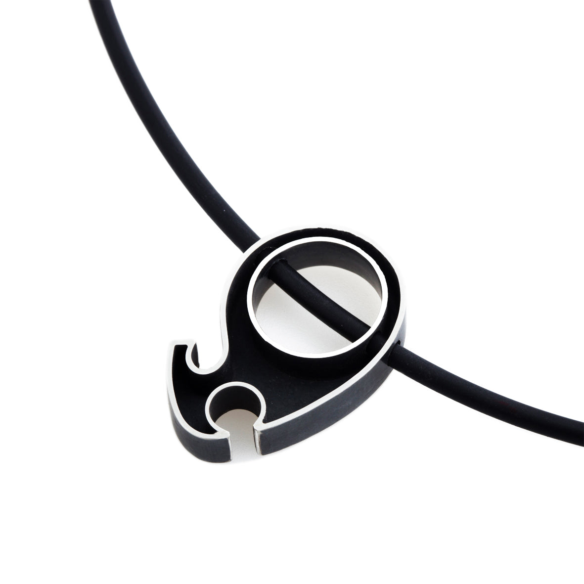 Abstract necklace and ring combination in silver with oxidised recess on rubber necklace by Sarah Herriot.