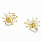 Satellite rings in silver with gold plated interior by Sarah Herriot.