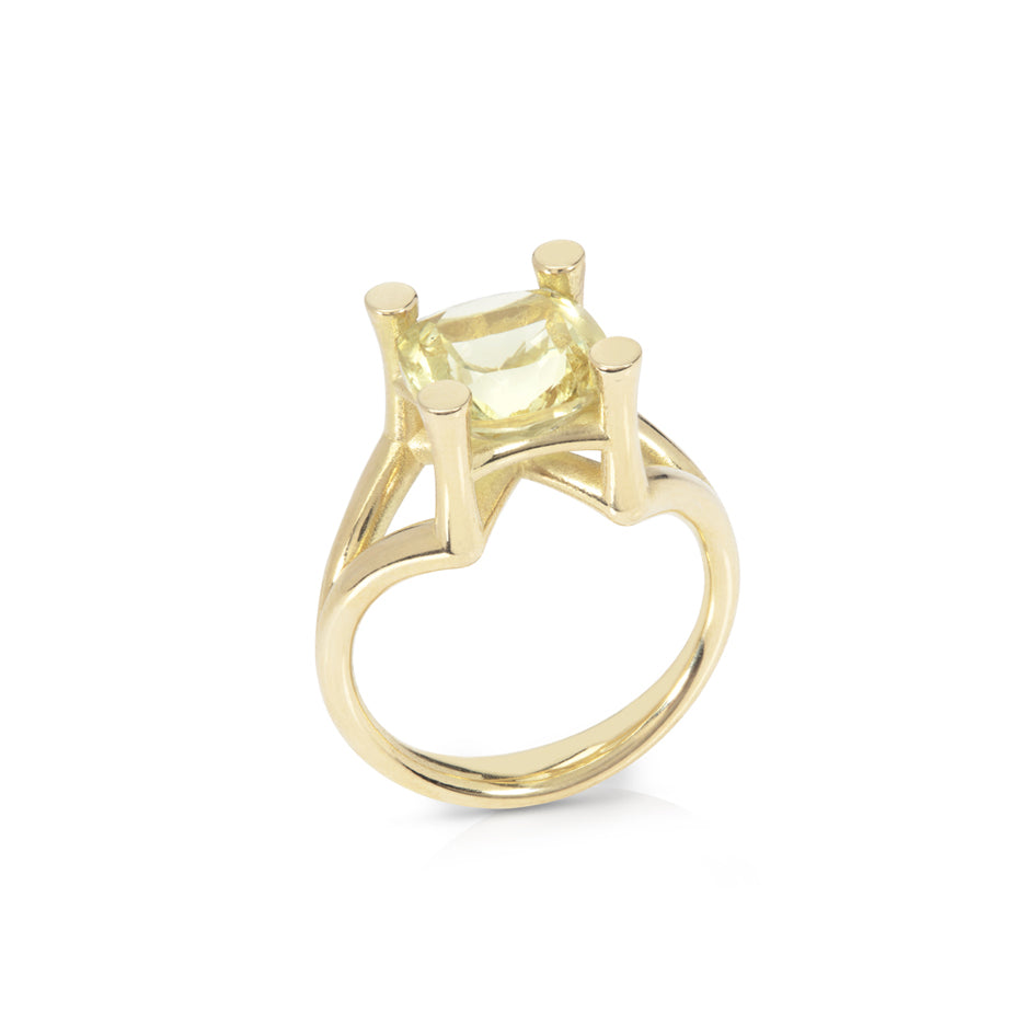 Scaffold ring in 18ct gold using unusual bold and open yet strong setting which allows the beautiful delicately coloured pale yellow green beryl to shine in all its glory. Scaffold ring by Sarah Herriot.