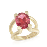 Scaffold ring in 18ct gold with oval rubellite tourmaline by Sarah Herriot.