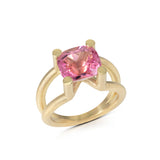 Scaffold ring in 18ct gold using unusual bold and open yet strong setting which allows the stunning pink tourmaline to shine in all its glory. Scaffold ring by Sarah Herriot.