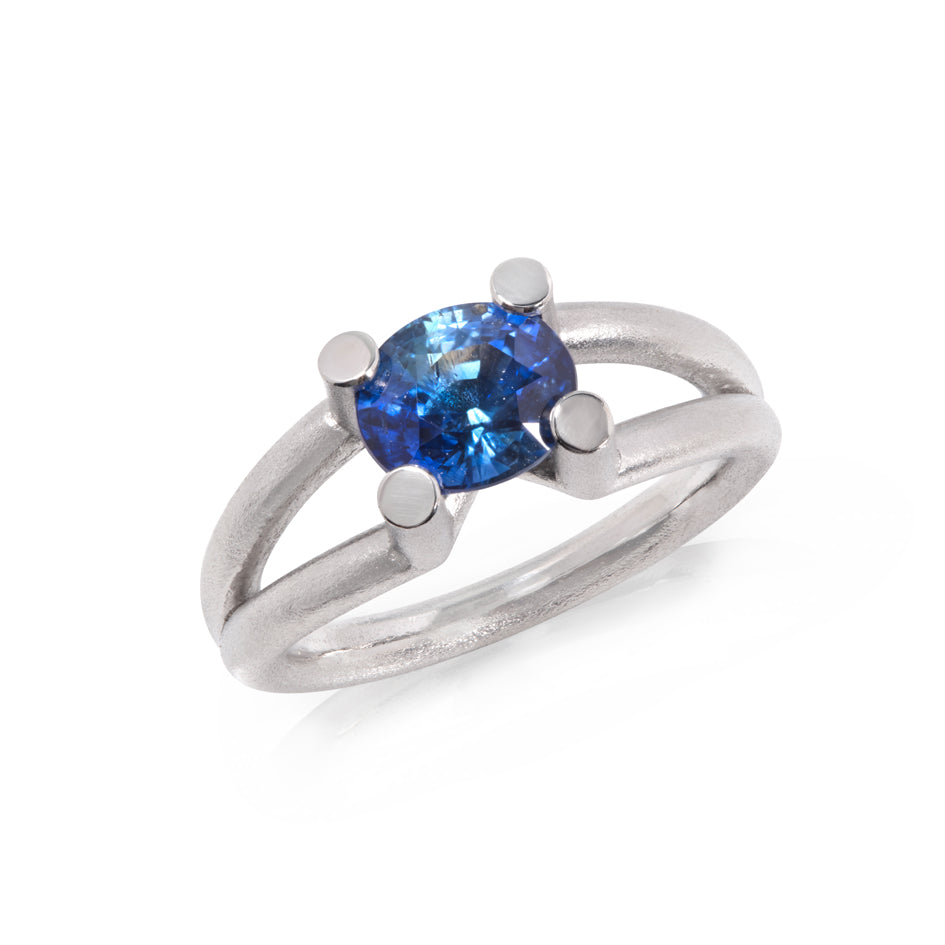 Scaffold ring in platinum with oval blue sapphire by Sarah Herriot.