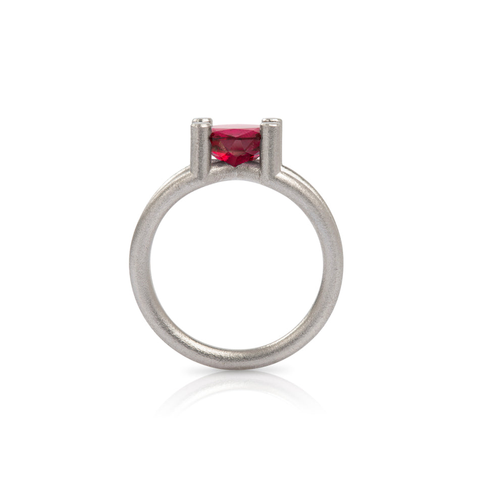 Scaffold ring in platinum with oval rubellite tourmaline by Sarah Herriot.