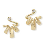 Acrobat earring are flowing loops of tapering 18ct gold tipped with a bright white diamond at the ear.  These earrings frame the ear beautifully, the loops making wonderful sculptural shapes. Acrobat earrings by Sarah Herriot.