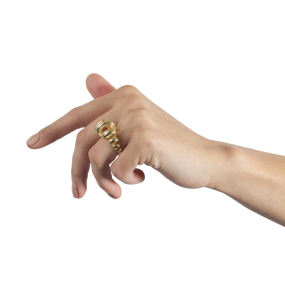18ct gold ring made from single looping thread, a modern take on an eternity ring, sculptural form.  Acrobat ring by Sarah Herriot.