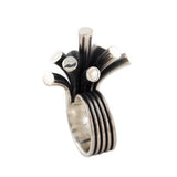 Splash ring in silver with oxidised recesses by Sarah Herriot.