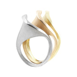Spooning rings in white, rose and yellow 18ct gold by Sarah Herriot.