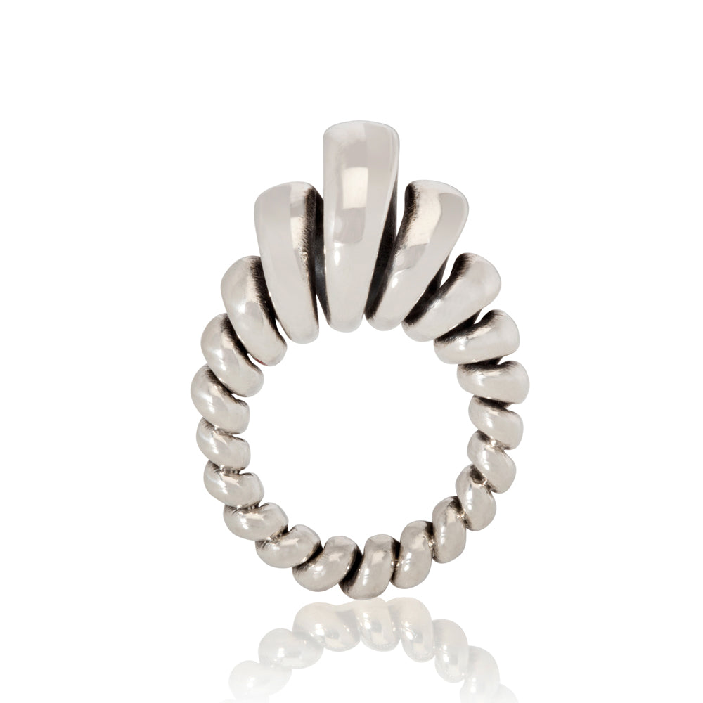 Silver ring made from single looping thread, a modern take on an eternity ring.  Acrobat ring by Sarah Herriot.