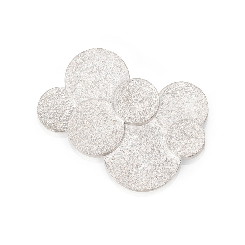 Magnificent staffa brooch formed of columns of sterling silver with a raw textured surface. The design is inspired by fingal's cave on the isle of staffa off the west coast of Scotland. Textured surfaces echo the natural basalt rock formations. Staffa ring by Sarah Herriot.
