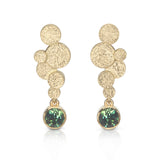 Ataffa earrings are formed of undulating discs of 18ct gold with rich blue green yellow sapphire drops. Staffa earrings by Sarah Herriot.
