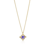 Staffa necklace is formed of undulating columns of 18ct gold with a gorgeous tanzanite nestled within. The design is inspired by Fingal's cave on the Isle of Staffa off the west coast of Scotland. Textured surfaces echo the natural basalt rock formations. Staffa necklace by Sarah Herriot.