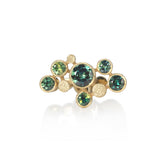 Staffa ring formed of undulating columns of 18ct gold set with six sea coloured Australian sapphires. Staffa ring by Sarah Herriot.