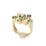 Staffa ring formed of undulating columns of 18ct gold set with six sea coloured Australian sapphires. Staffa ring by Sarah Herriot.