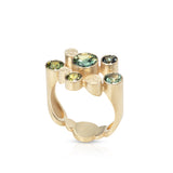Staffa ring formed of undulating columns of 18ct gold set with six sea coloured Australian sapphires. Staffa ring by Sarah Herriot.