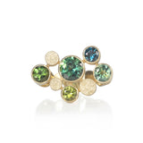 Staffa ring formed of undulating columns of 18ct gold set with six sea coloured Australian sapphires. Staffa ring by Sarah Herriot.