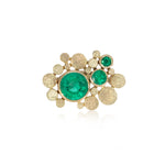 Staffa ring formed of undulating columns of 18ct gold and three gorgeous emeralds nestled within.  Staffa ring by Sarah Herriot.