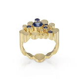 Staffa ring in 18ct gold with vibrant blue sapphires. Staffa ring by Sarah Herriot.