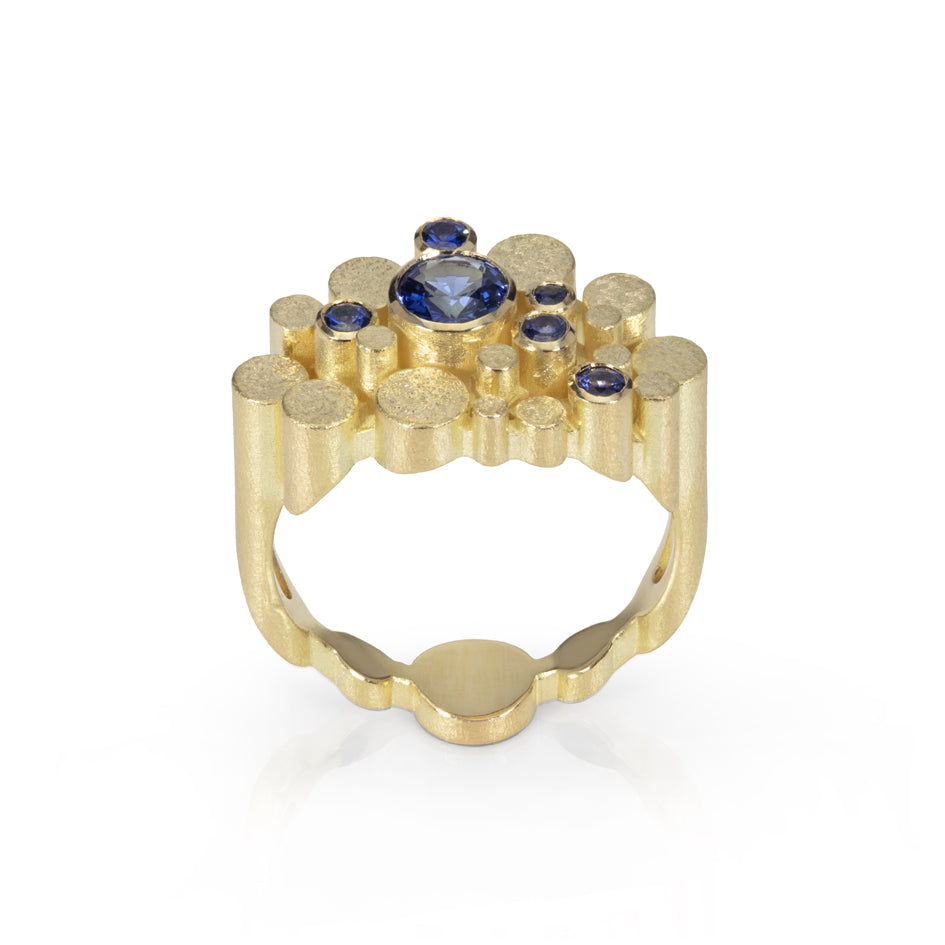 Staffa ring in 18ct gold with vibrant blue sapphires. Staffa ring by Sarah Herriot.