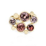 Staffa ring in 18ct gold with vibrant mauve sapphires. Staffa ring by Sarah Herriot.