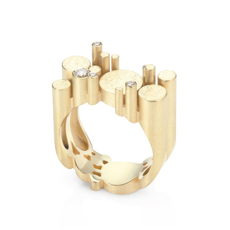 Magnificent Staffa ring in 18ct gold, set with a scattering of while diamonds over the stacked column structure,  Staffa ring by Sarah Herriot.