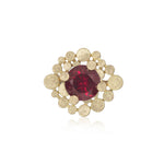 Staffa ring formed of undulating columns of 18ct gold and a stunning deep red rubellite tourmaline nestled within.  Staffa ring by Sarah Herriot.