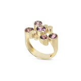 Staffa ring formed of undulating columns of 18ct gold with a scatter of mauve spinels in gorgeous shades.  Staffa ring by Sarah Herriot.