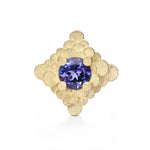 Staffa ring formed of undulating columns of 18ct gold and a gorgeous tanzanite nestled within.  Staffa ring by Sarah Herriot.