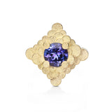Staffa ring formed of undulating columns of 18ct gold and a gorgeous tanzanite nestled within.  Staffa ring by Sarah Herriot.