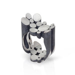 Staffa ring in silver with oxidised and textured exterior by Sarah Herriot.