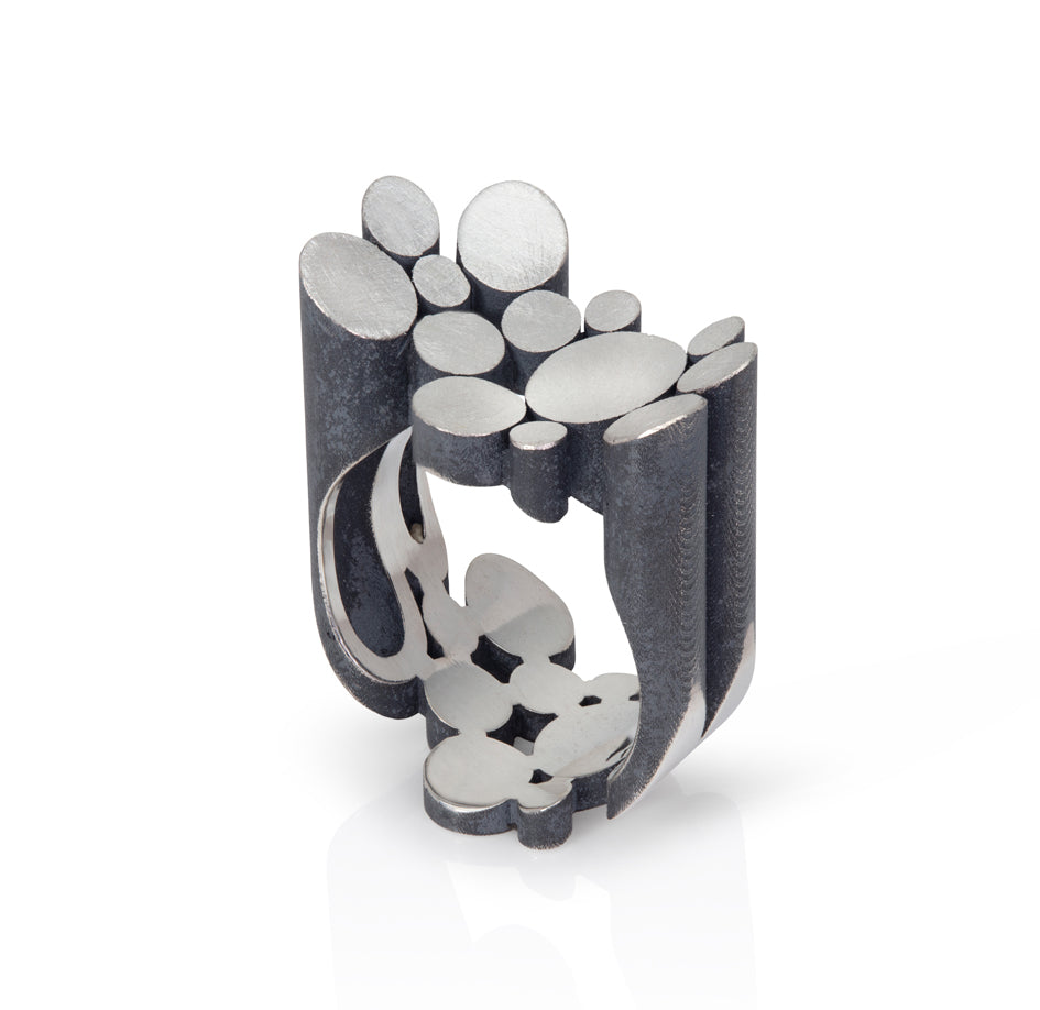 Staffa ring in silver with oxidised and textured exterior by Sarah Herriot.