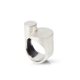 Magnificent staffa ring formed of columns of sterling silver with a raw textured surface. The design is inspired by fingal's cave on the isle of staffa off the west coast of Scotland. Textured surfaces echo the natural basalt rock formations. Staffa ring by Sarah Herriot.