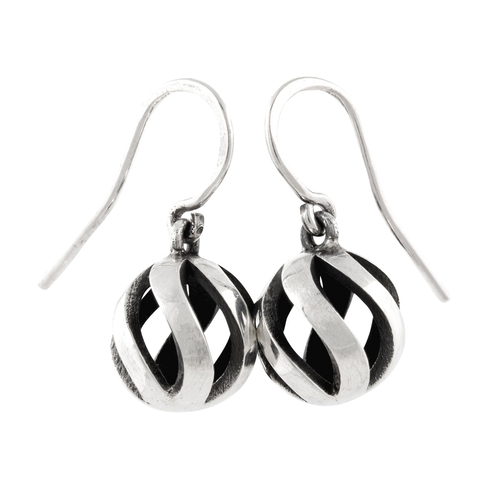 Sun earrings in silver with oxidised interior by Sarah Herriot.