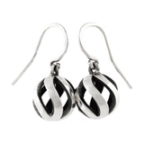 Sun earrings in silver with oxidised interior by Sarah Herriot.