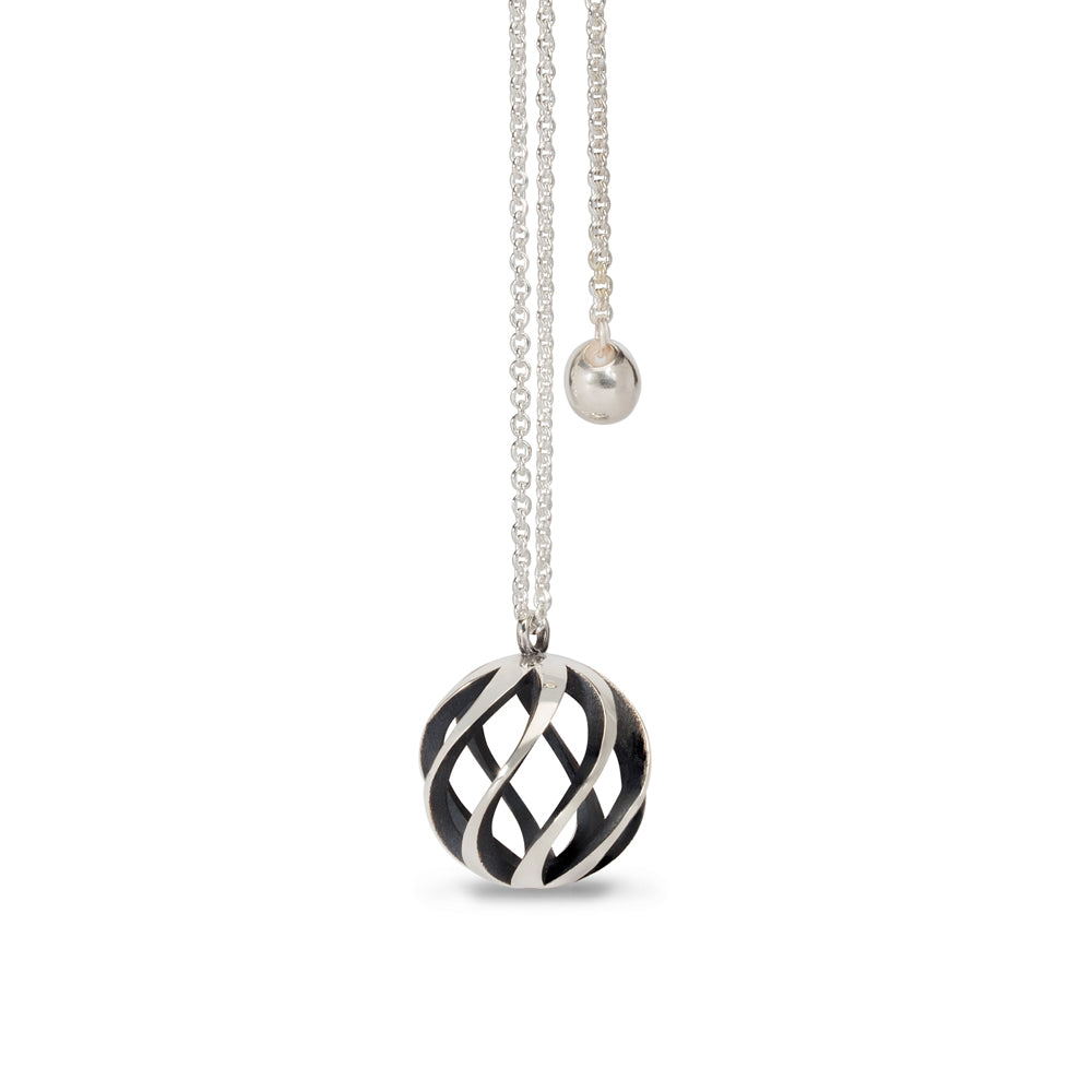 Sun in silver with oxidised interior by Sarah Herriot.