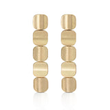 Tile drop earrings formed of linked squares with curved faces in18ct gold with a deep textured finish. Tile drop earrings by Sarah Herriot