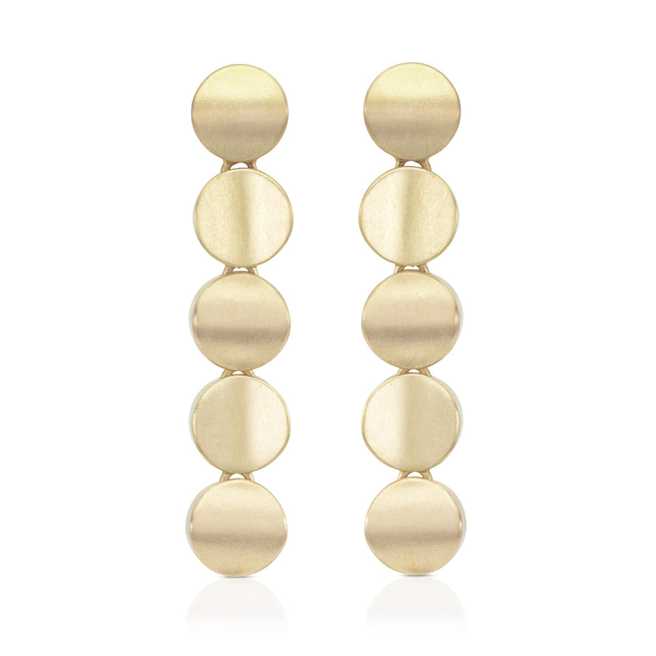 Round tile earrings in 18ct gold with undulating surface by Sarah Herriot.